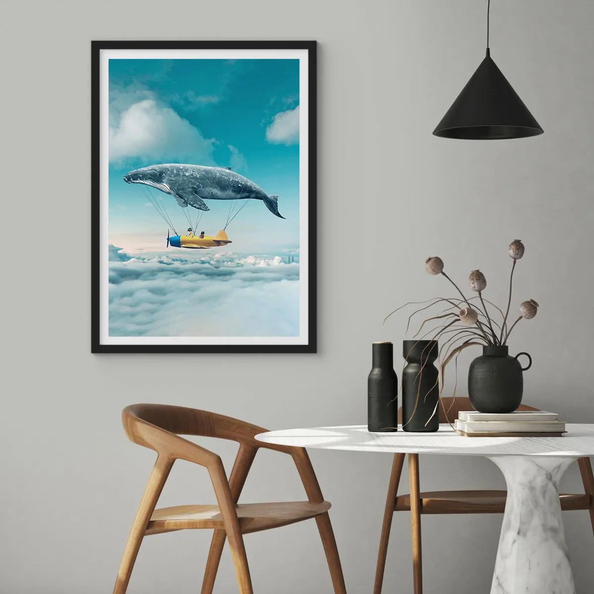 Plakat i sort ramme - Et fantastisk billede af en hval, der løfter et fly over skyerne. - 50x70cm - Hvorfor ikke? - Moderne vægdekoration til stue og soveværelse ARTTOR